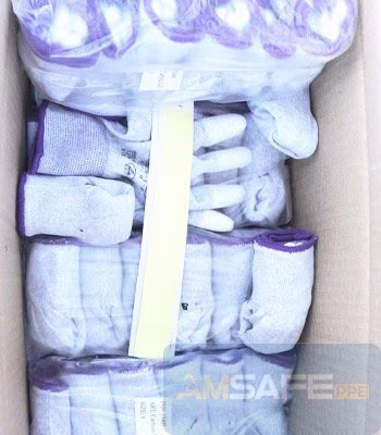 Guantes enrollados por par dentro de una caja